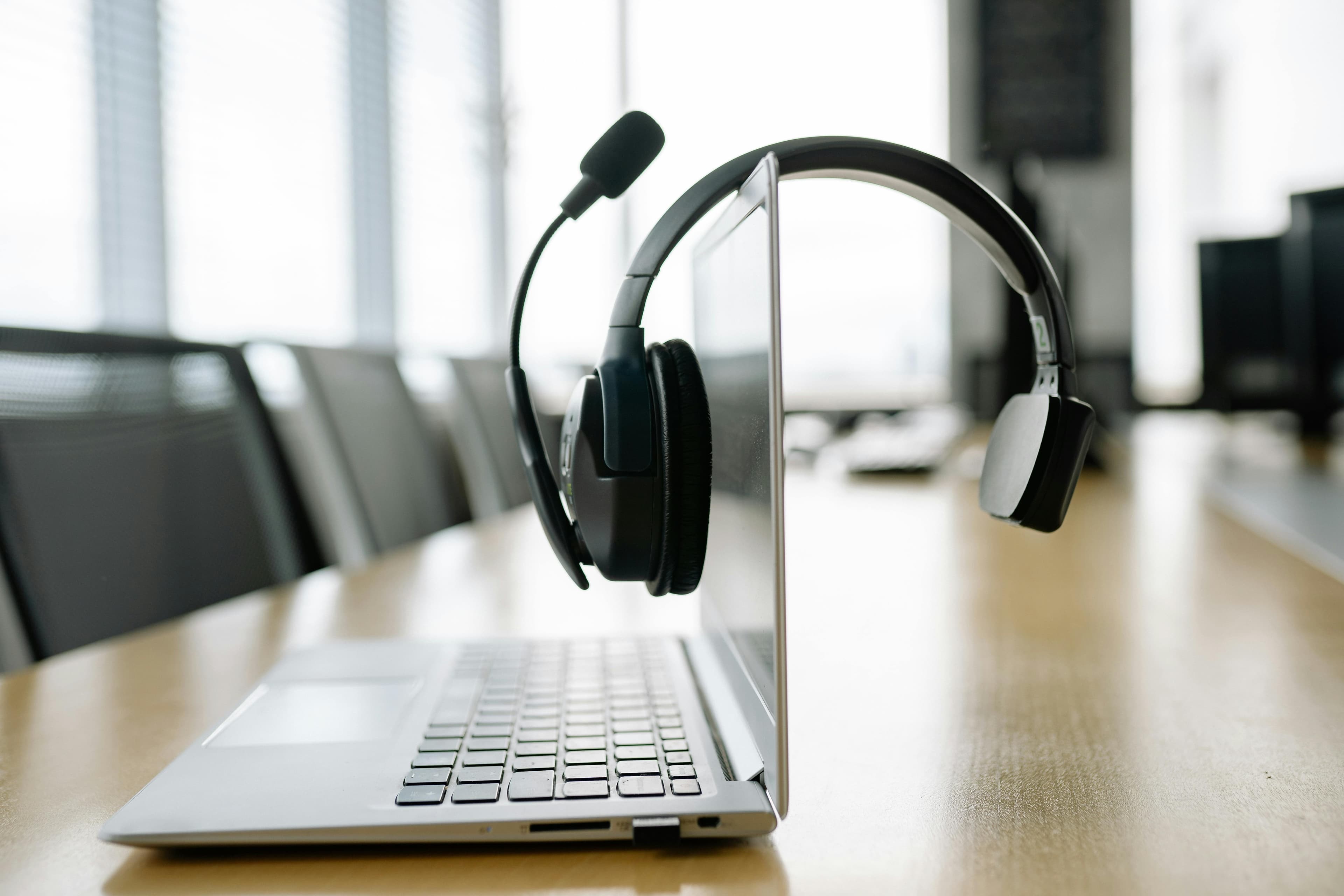 Headphones and smartwatch on a desk